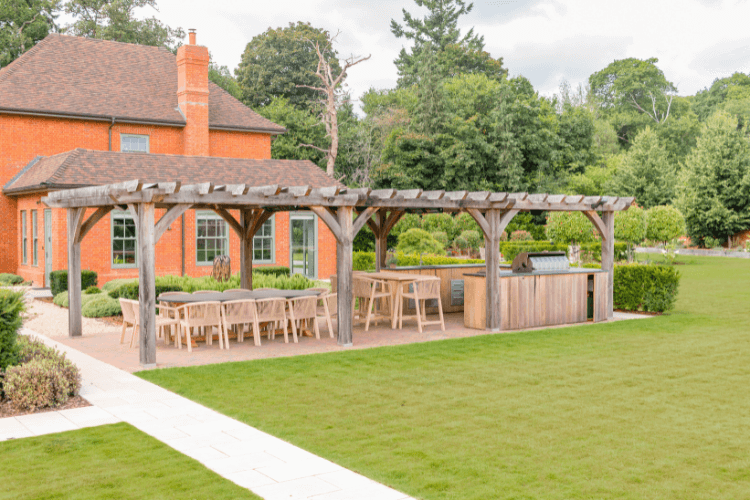 outdoor kitchen and dining area